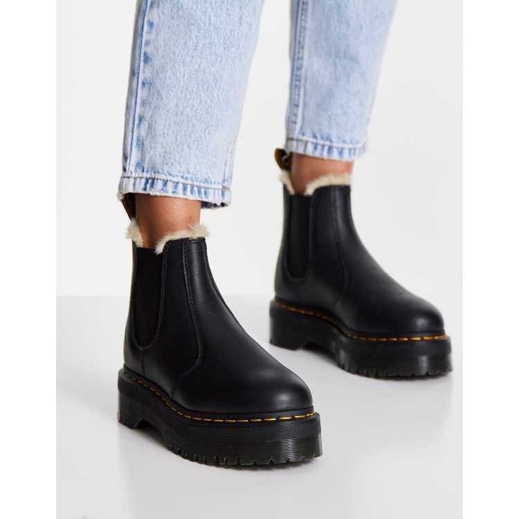 Dr martens black fur sales lined boots