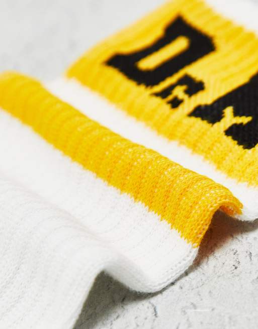 Dr. Martens – Biało-żółte skarpetki sportowe unisex z logo, 2 z 4