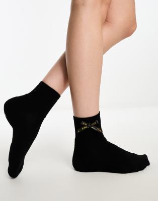 Dr Martens Calzini neri con fiocco