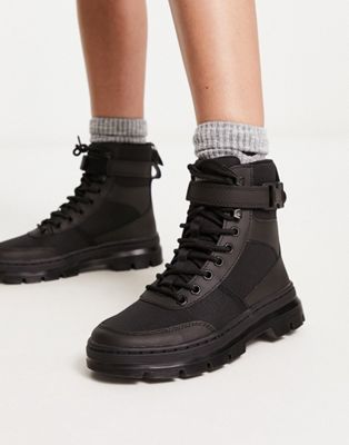 Dr Martens Combs tech ankle strap ankle boots in black | ASOS