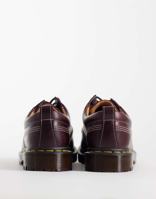 Dr Martens - Lowell - Uniseks schoenen met contrasterende stiksels in kersenrood, 3 van 4