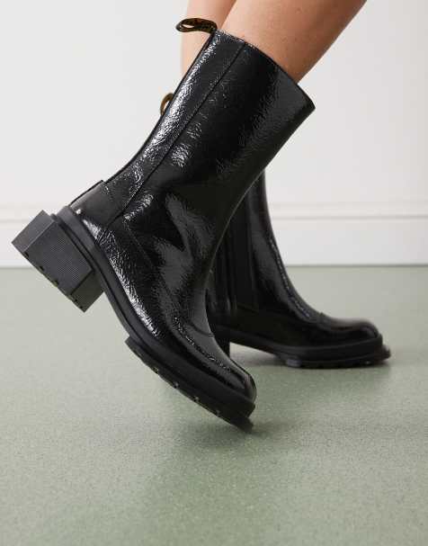 Dr. Martens – Maybole Hi – Stiefel in schwarzer, rissiger Lackoptik - view 1
