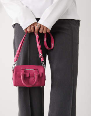 Dr Martens Dr Martens mini top handle bag in fuchsia pink