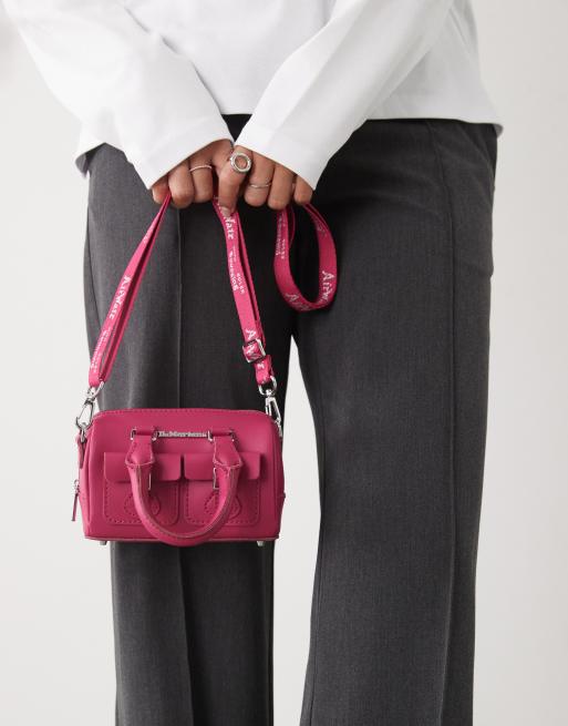 Dr Martens mini top handle bag in Fuchsia