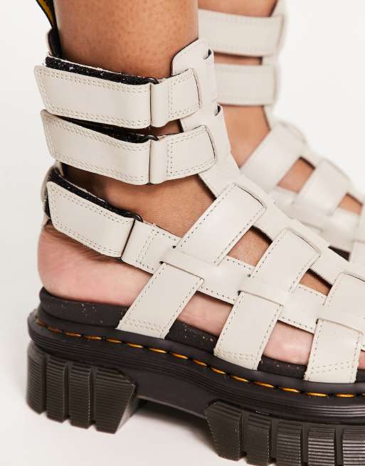 Dr. Martens – Ricki – Kullerstensgrå gladiatorsandaler i läder, 2 av 4