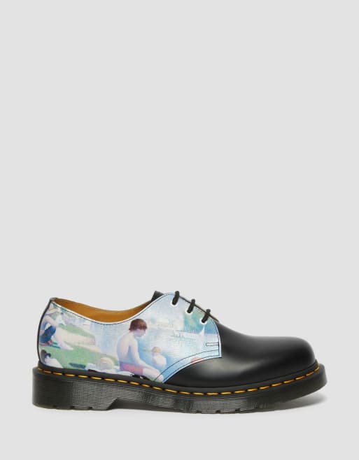 Dr martens hotsell grigie basse