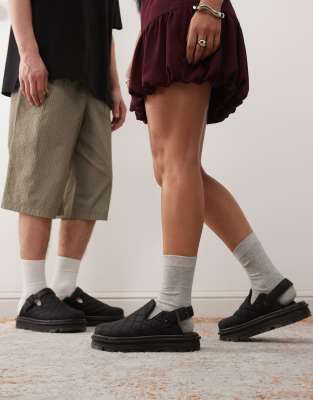 Dr. Martens - ZebZag - Gesteppte Unisex-Mules in Schwarz