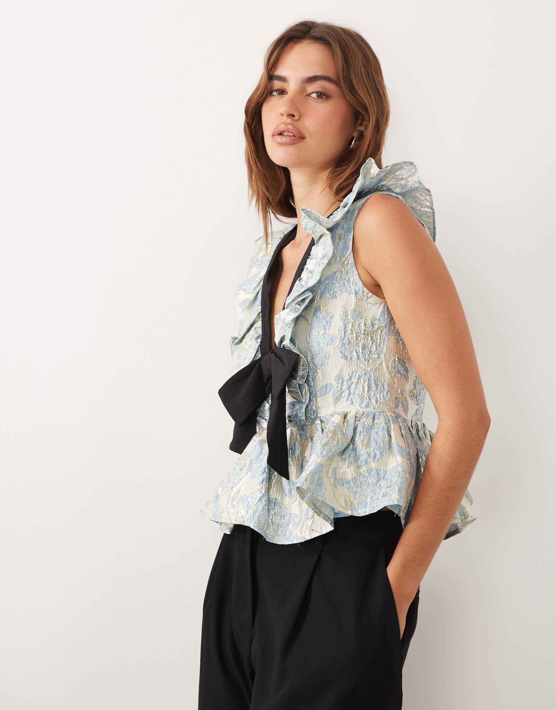 dream sister jane bluebell jacquard v-neck peplum hem bow detail top in light blue floral