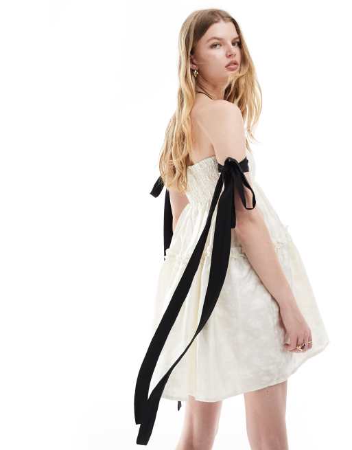 Dream Sister Jane contrast bow sleeve jacquard mini dress in ivory