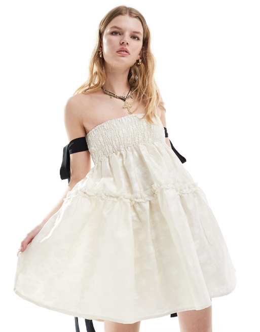 Dream Sister Jane contrast bow sleeve jacquard mini dress in