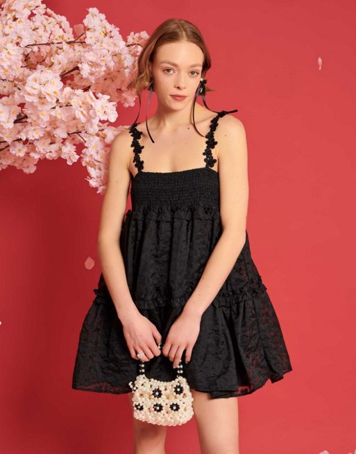 Dream Sister Jane flower strap jacquard mini dress in black co-ord