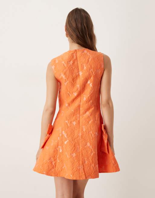 Dream Sister Jane jacquard bow mini dress in tangerine, 3 of 4