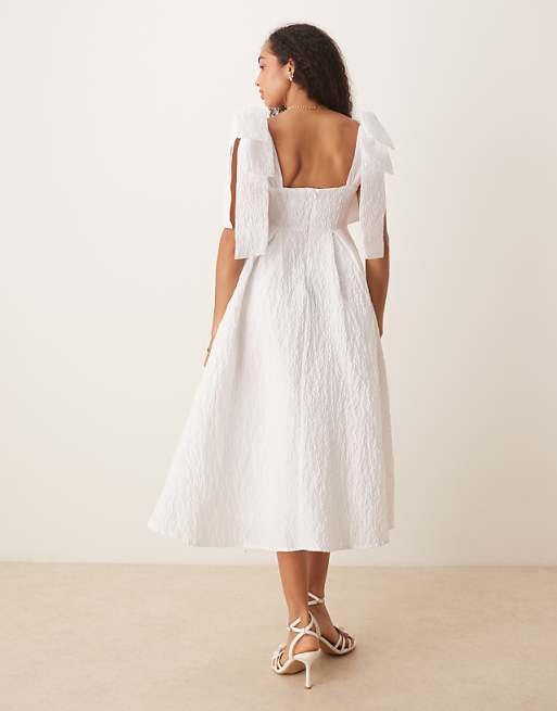 white jacquard dress Caroline Gown Bubble XXS / White to this little white dress with a satiny woven jacquard construction Dream Sister Jane Prairie Bow