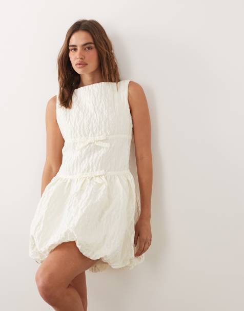 Dream Sister Vitsippa jacquard boat neck sleeveless bubble hem mini dress in ivory - view 1