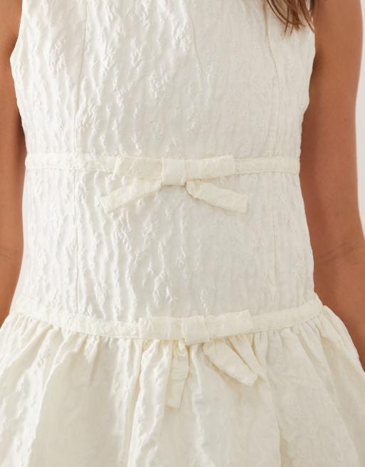 Dream Sister Vitsippa jacquard boat neck sleeveless bubble hem mini dress in ivory, 3 of 4