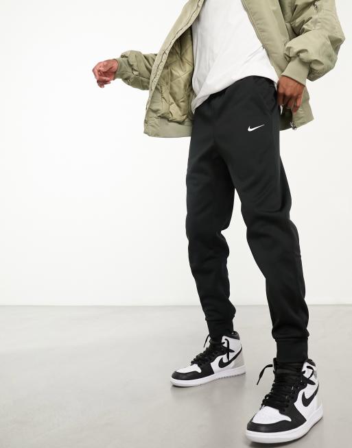 Dri-Fit sorte joggingbukser med tilspidsede ben fra Nike Training