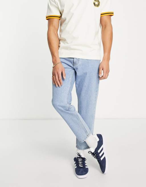 DTT – Ankellånga, styva jeans med avsmalnande passform och ljusblå stentvätt