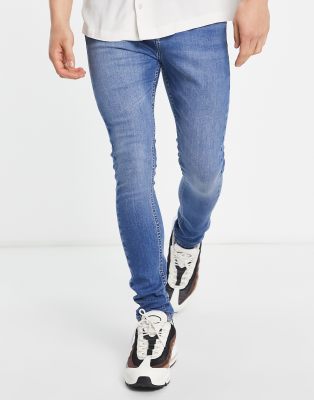 DTT carrot fit jeans in mid blue