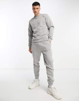 DTT crew neck sweatshirt & jogger tracksuit set in light grey marl