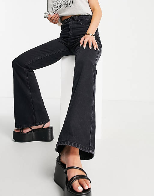 DTT flare leg jeans with folded waist in washed black 