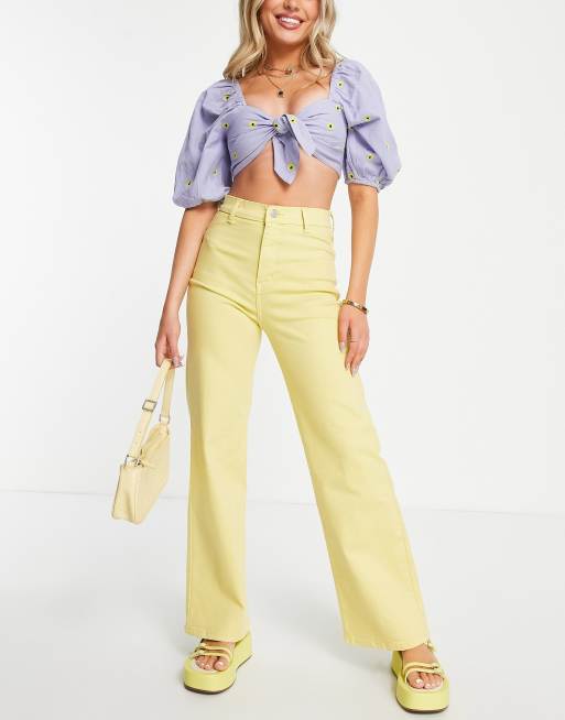 Yellow jeans on sale