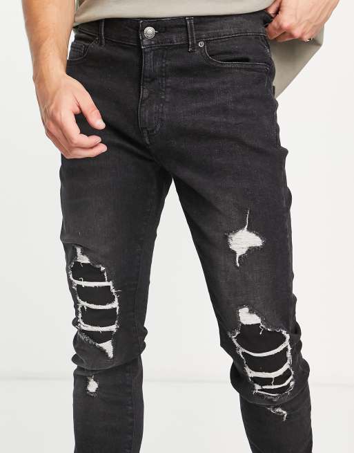 DTT – Jeans in verwaschenem Schwarz mit engem Schnitt und geflickten Rissen , 3 von 4