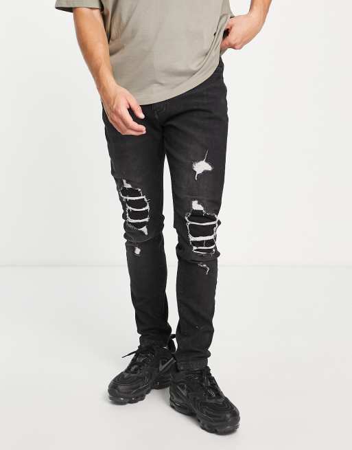 DTT – Jeans in verwaschenem Schwarz mit engem Schnitt und geflickten Rissen , 4 von 4