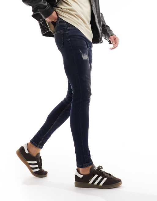 DTT - Jeans skinny elasticizzati invecchiati blu scuro con strappi