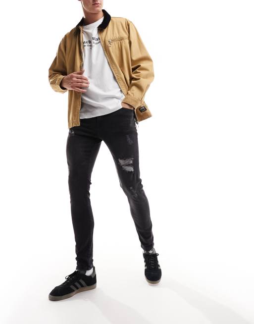 DTT - Jeans skinny elasticizzati invecchiati nero slavato con strappi
