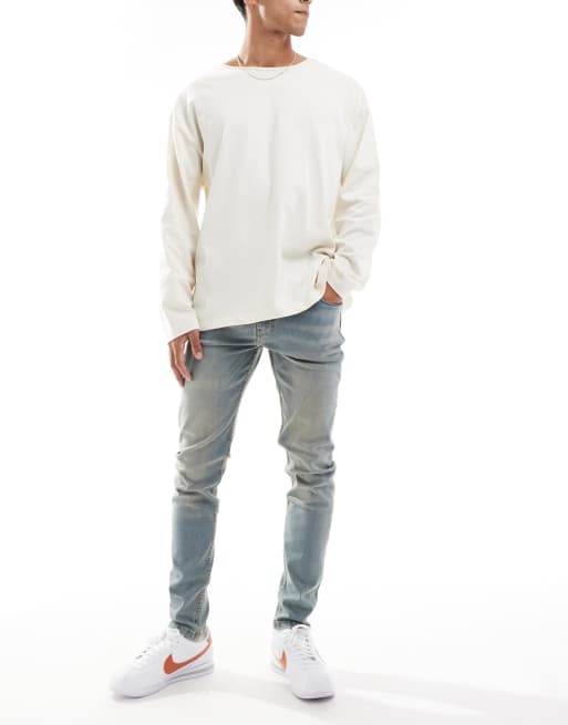 DTT - Jeans super skinny elasticizzati azzurri con tinta vintage