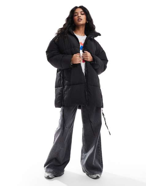 DTT longline puffer jacket in black - view 1