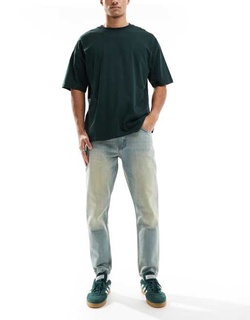 DTT - Lyseblå stive tapered jeans med vintage-tone