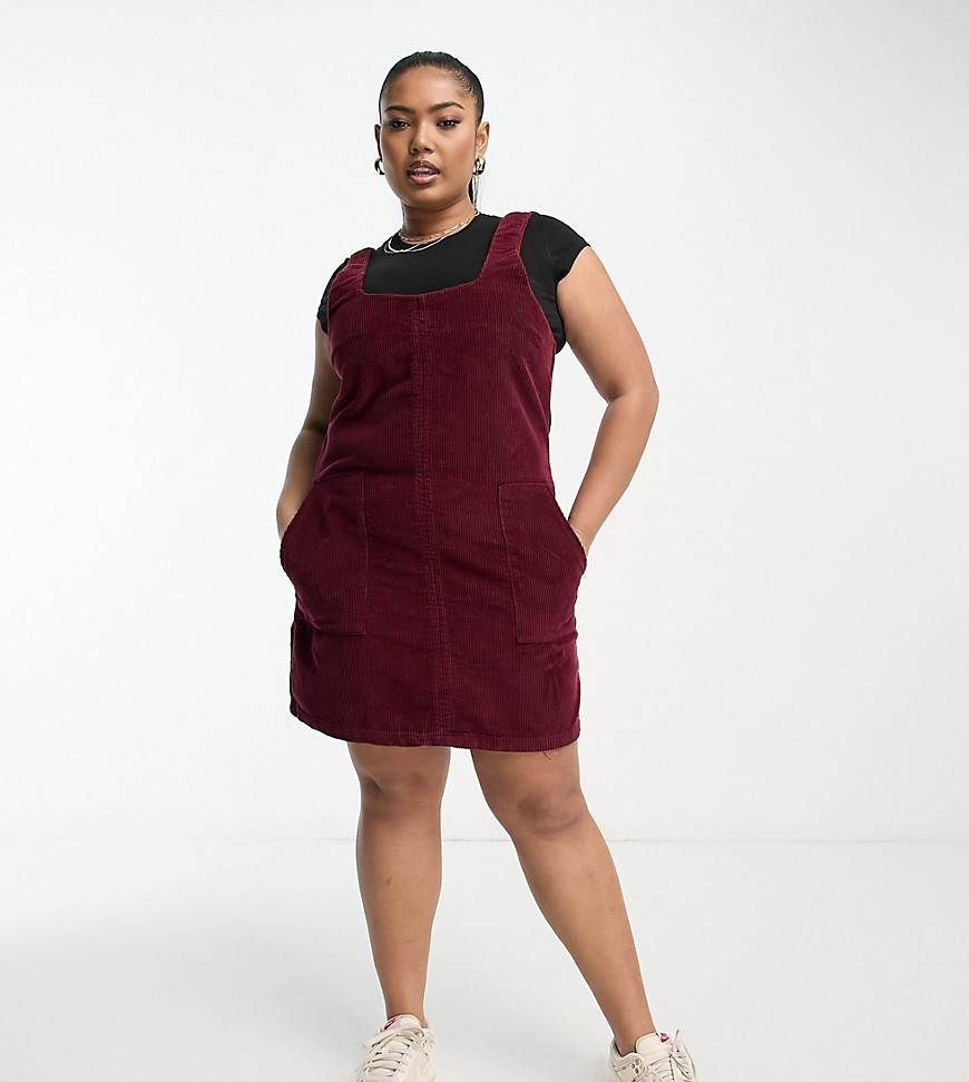DTT Plus Dawn cord pinafore dress with zip back in burgundy-Red