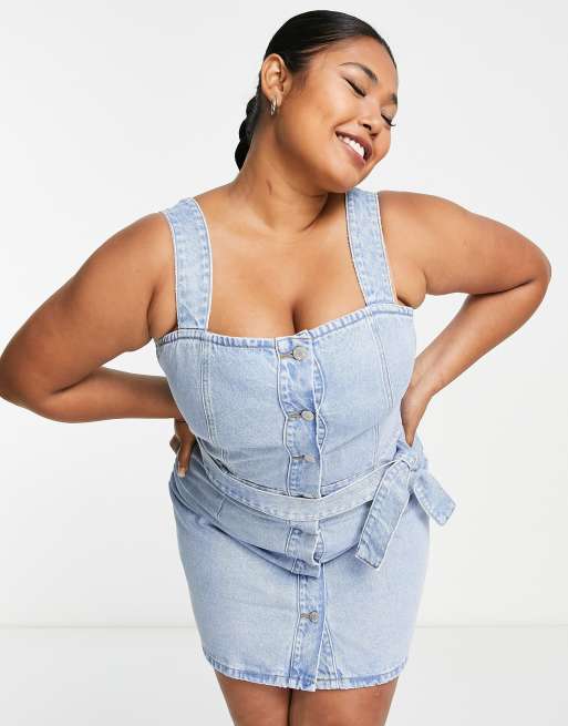 DTT Plus denim pinafore dress with tie waist in light blue ASOS