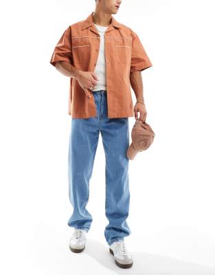 Don't Think Twice DTT rigid baggy fit jeans in light blue