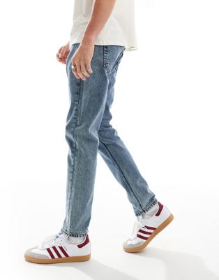 DTT rigid slim fit jeans in light blue acid wash