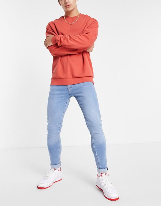 DTT – Schmal geschnittene Jeans in Hellblau 