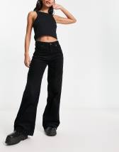 Don't Think Twice Tall DTT Tall flare leg jeans with folded waist in washed  black 