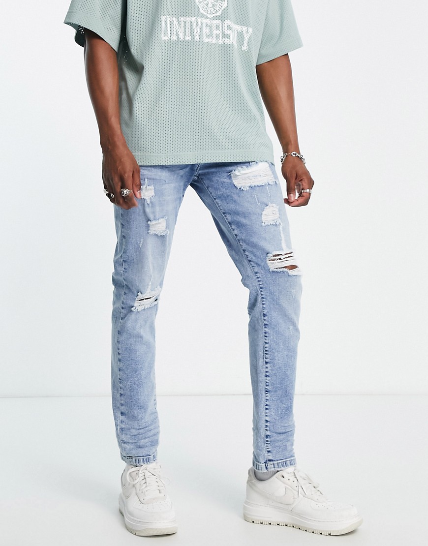 Don't Think Twice DTT slim fit extreme rip jeans in light blue
