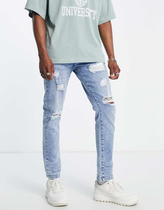 https://images.asos-media.com/products/dtt-slim-fit-extreme-rip-jeans-in-light-blue/202261846-1-blue?$n_550w$&wid=550&fit=constrain