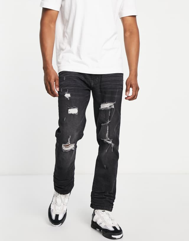 DTT slim fit extreme rip jeans in washed black