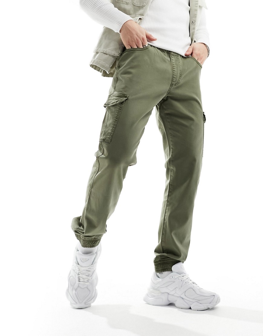 DTT slim fit garment dyed cuffed cargo trousers in khaki-Green