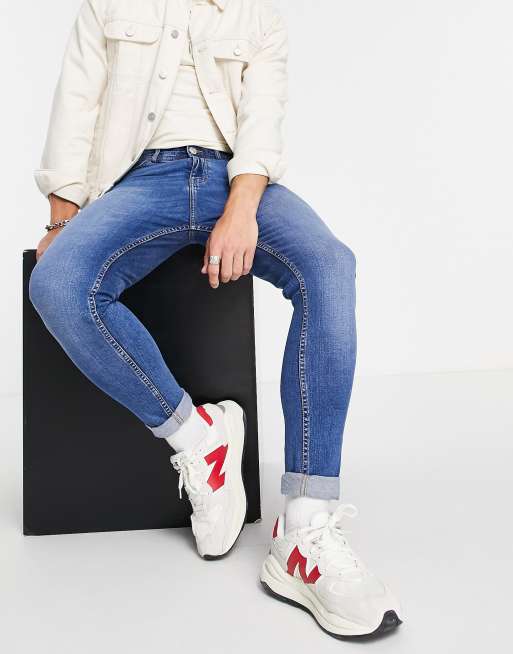 DTT - Smaltoelopende jeans in middenblauw 