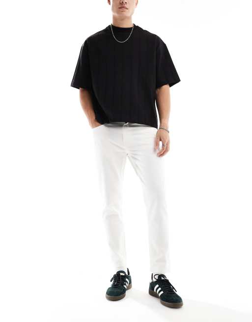 DTT - Stugge, cropped jeans met toelopende pasvorm in wit