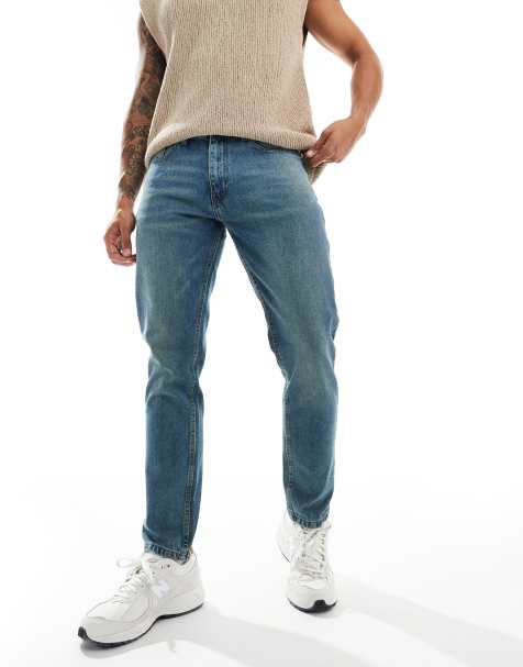 DTT - Stugge slim-fit jeans in middenblauw met vintage tint - view 1