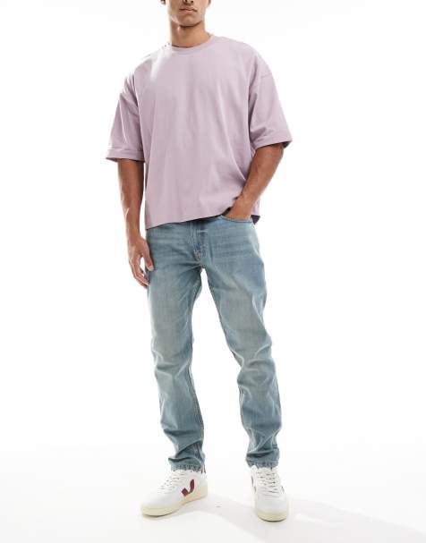 DTT - Stugge slim-fit jeans in middenblauw met vintage tint - view 1