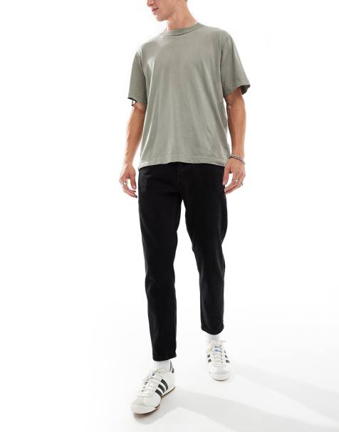 DTT – Svarta, styva, avsmalnande jeans i kort design med tvättad finish - view 1