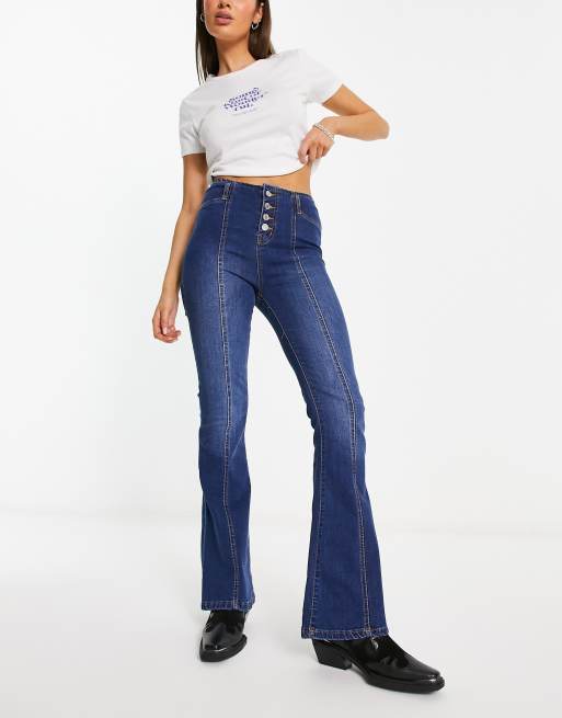 DTT – Travis – Blåtvättade vida jeans med hög midja och knappar framtill