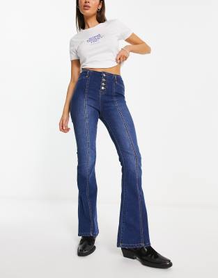 DTT Travis high waisted wide leg jeans with button front in washed blue