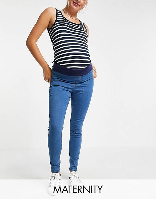 DTT - Zwangerschapskleding - Chloe - Elastische, onder de buik vallende skinny disco jeans in blauw met mid-wash 